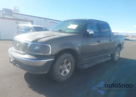 2002 Ford F-150 Lariat/Xlt z USA, uszkodzony, nr VIN 1FTRW07L92KE41395